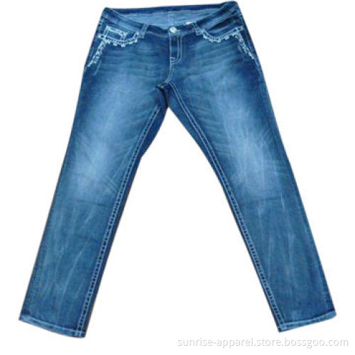 Women's denim jeans, embroidered and distressed
